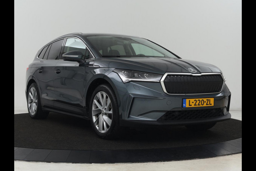Škoda ENYAQ iV 80 | Warmtepomp | Trekhaak | Matrix LED | Adaptive cruise | Keyless | Camera | Half leder | Stuurverwarming | Memory | Navigatie | Climate control | Dodehoek detectie | Getint glas