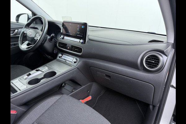 Hyundai Kona EV 64kWh SOH-100% Warmtepomp Adaptive-Cruise Head-Up Display 1/2 Leer Krell®-Hifi Apple Carplay Android Adap.Cruise Camera Navi  Keyless Privacy Glas DAB Led Blind Spot Lane Assist Origineel Nederlandse Auto