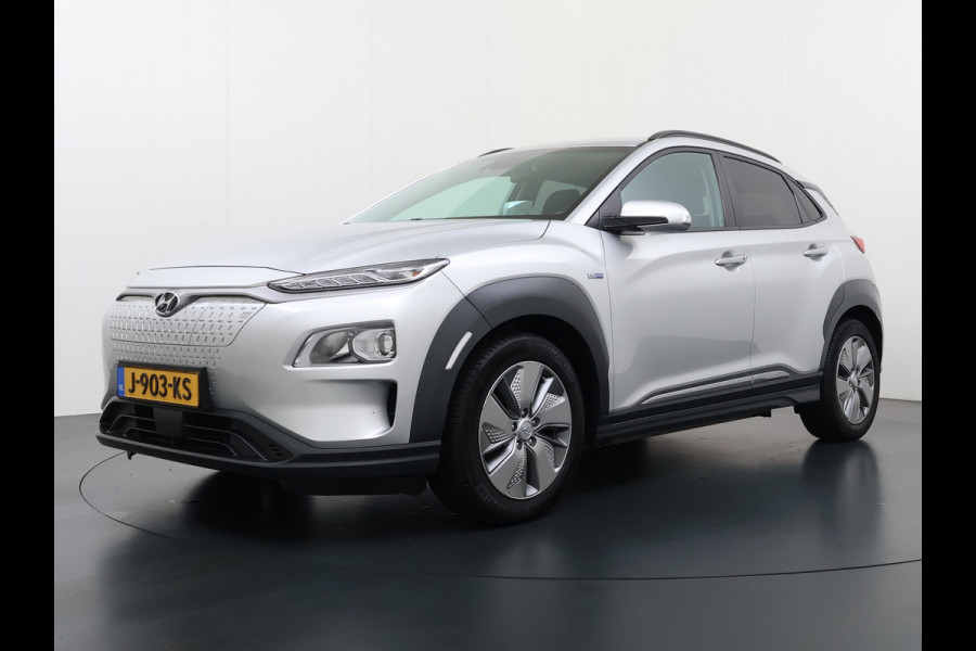 Hyundai Kona EV 64kWh SOH-100% Warmtepomp Adaptive-Cruise Head-Up Display 1/2 Leer Krell®-Hifi Apple Carplay Android Adap.Cruise Camera Navi  Keyless Privacy Glas DAB Led Blind Spot Lane Assist Origineel Nederlandse Auto