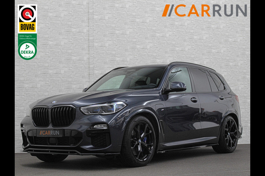BMW X5 45e M-Stoelen | M-Performance | 360 Camera | ACC | Indiv. Leder | Harman-Kardon | Laser-LED | Keyless-Entry | Stoelventilatie | Head-Up | Memory | 21'' | Sfeerverlichting | Trekhaak | Luchtvering | Rij-Assistent Pro | Carplay | Black-Optic | Draadloos Laden.