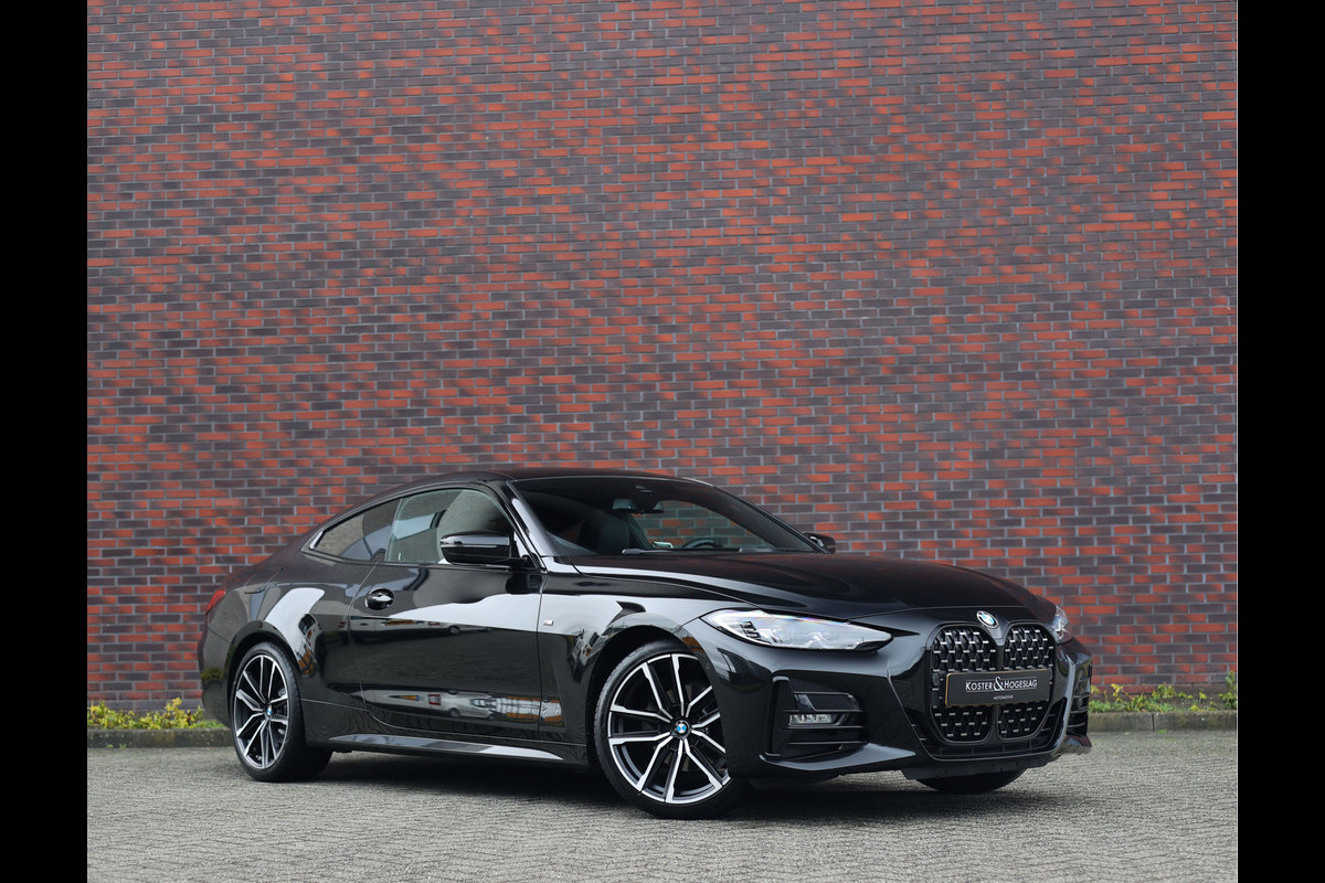 BMW 4 Serie Coupé 420i | M-Sport - HUD - Schuifdak