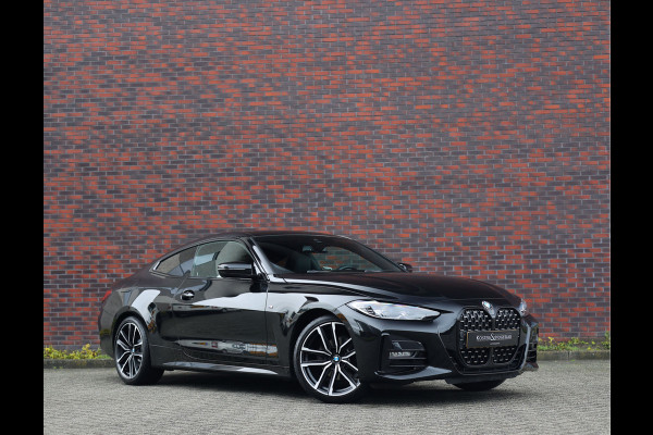 BMW 4 Serie Coupé 420i | M-Sport - HUD - Schuifdak