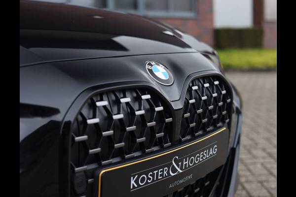 BMW 4 Serie Coupé 420i | M-Sport - HUD - Schuifdak
