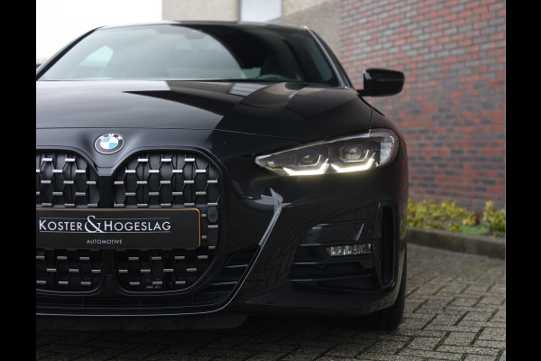 BMW 4 Serie Coupé 420i | M-Sport - HUD - Schuifdak