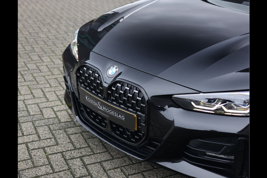 BMW 4 Serie Coupé 420i | M-Sport - HUD - Schuifdak