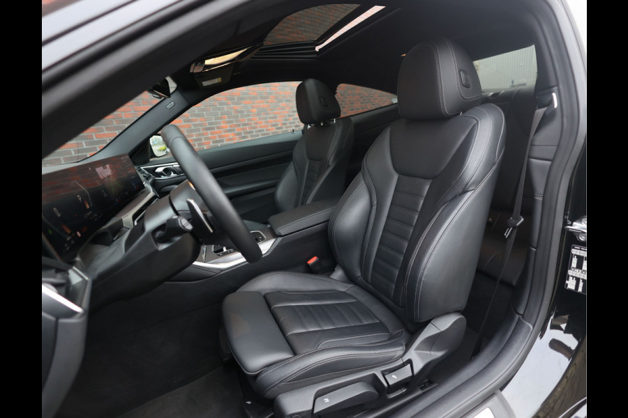 BMW 4 Serie Coupé 420i | M-Sport - HUD - Schuifdak