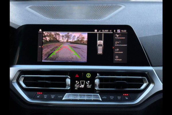 BMW 3 Serie Touring 330e M sport individual, dravitgrau, panoramadak ,laser,elec bedienbare trekhaak, vol opties, nl auto met nap