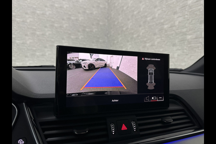 Audi Q5 Sportback 40 TFSI Benzine S-Line | ACC | Sfeerverlichting | Keyless-Entry | Matrix-LED | Virtual-Cockpit | Tour-Pakket | Black-Optic | Camera | Beker-Clima | 3-Zone Clima | Draadloos Laden | Zonwering | 6 mnd. BOVAG Garantie |