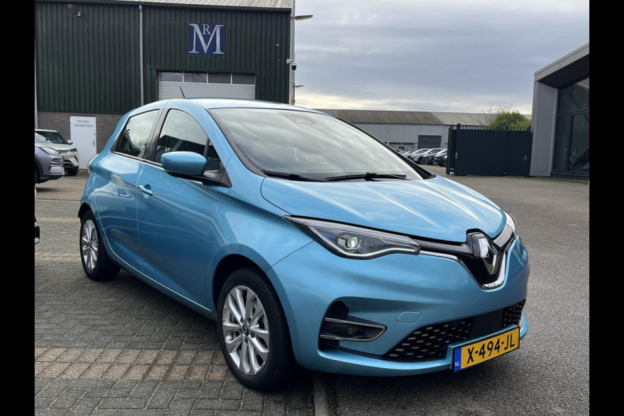 Renault ZOE R135 Intens 52 kWh VAN: €16.900- VOOR: €13.877,- UW EINDEJAARSVOORDEEL: €3.023 |SOH 94% KOOPACCU | 3-FASE LADER + SNELLAADFUNCTIE | STOEL + STUURWIELVERWARMING | CAMERA | NAVI |Rijklaar geleverd met 12 maanden BOVAG-garantie