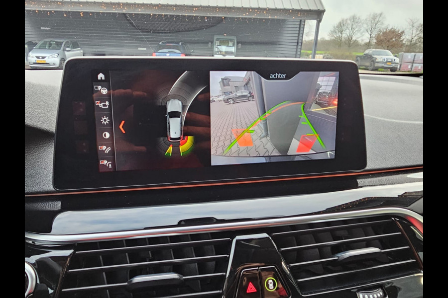 BMW 5 Serie Touring 520i High Executive Sport Line | Automaat | Trekhaak | Navi | Stoel & stuurverwarming | Camera |