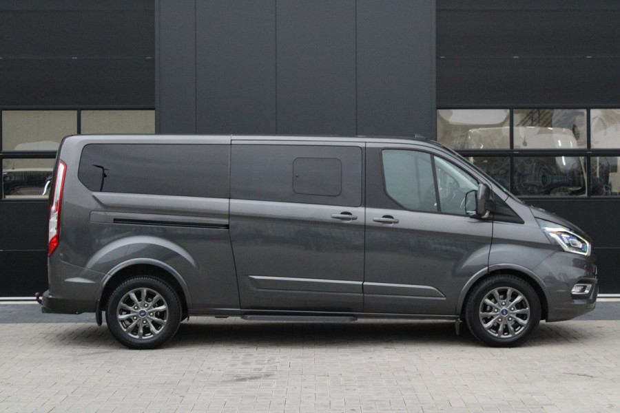 Ford Tourneo Custom 320 2.0 TDCI L2H1 185pk - 2x Schuif - Xenon - Trekhaak - Standkachel - Leder - Camera - Carplay - Blindspot - Rijklaar