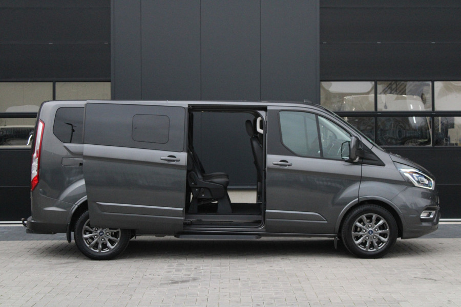 Ford Tourneo Custom 320 2.0 TDCI L2H1 185pk - 2x Schuif - Xenon - Trekhaak - Standkachel - Leder - Camera - Carplay - Blindspot - Rijklaar