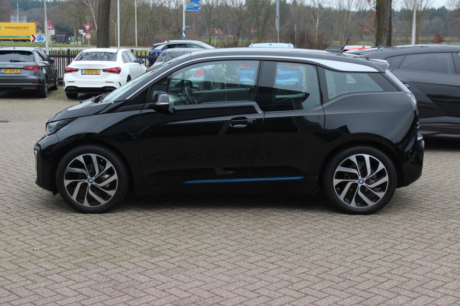 BMW i3 Basis 120Ah 42 kWh / SoH 91.4% Navigatie / 19'' / Parkeerhulp achter / Navigatie / Harman Kardon / Stoelverwarming / Cruise Control / Warmtepomp / Getint glas