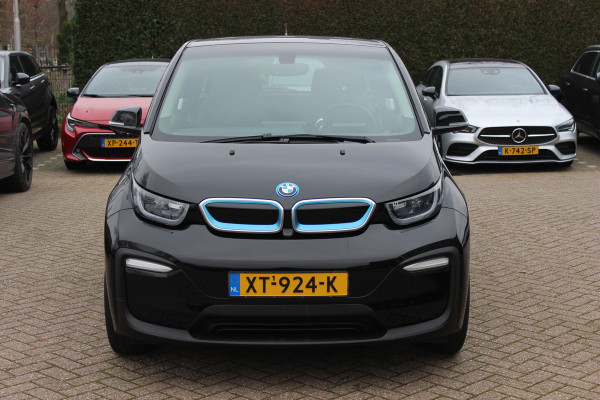 BMW i3 Basis 120Ah 42 kWh / SoH 91.4% Navigatie / 19'' / Parkeerhulp achter / Navigatie / Harman Kardon / Stoelverwarming / Cruise Control / Warmtepomp / Getint glas