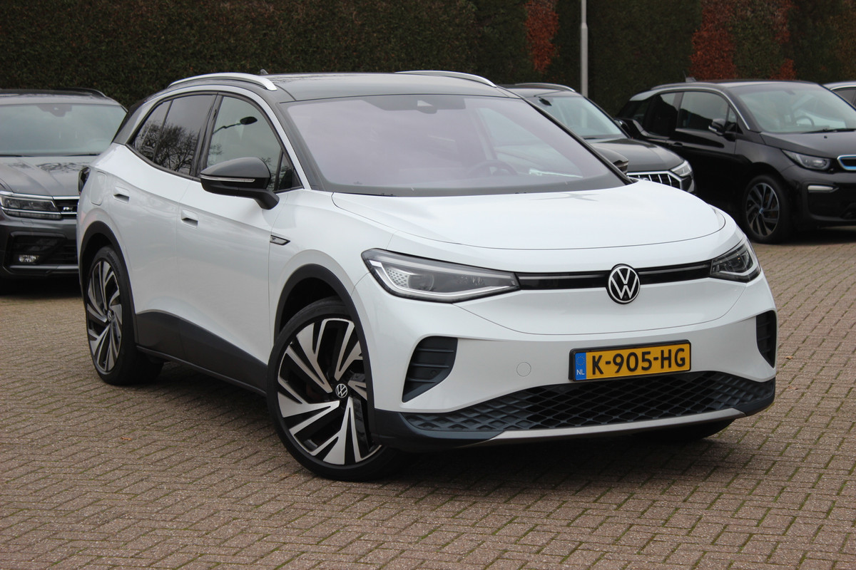 Volkswagen ID.4 First Max 77 kWh / SoH 91.2% / Full option! / Trekhaak / Panoramadak / Camera / Head-up / Keyless / 21'' / ACC / Dodehoek / Elektr. stoelen / Massage / Navigatie / Stuurverwarming