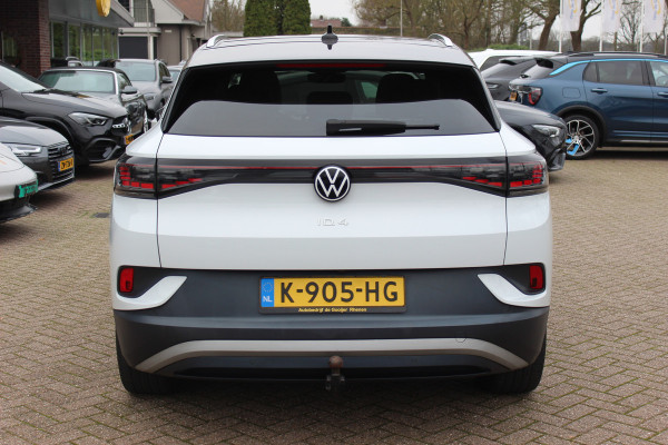 Volkswagen ID.4 First Max 77 kWh / SoH 91.2% / Full option! / Trekhaak / Panoramadak / Camera / Head-up / Keyless / 21'' / ACC / Dodehoek / Elektr. stoelen / Massage / Navigatie / Stuurverwarming