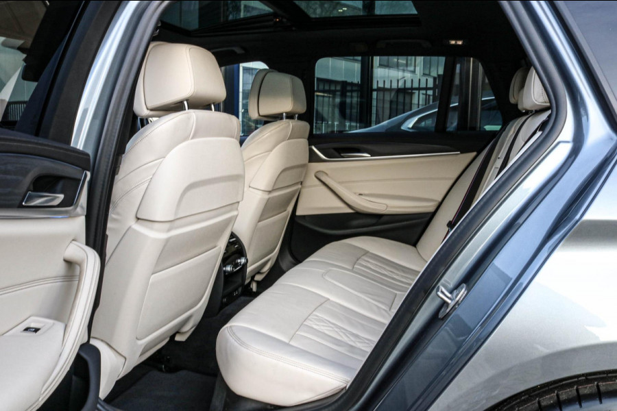 BMW 5 Serie Touring 530e xDrive M-Sport | Trekhaak | Pano | Soft close | Laser | Massage | Ambient Air | Head Up | Achterassturing