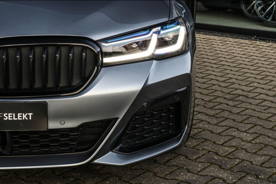 BMW 5 Serie Touring 530e xDrive M-Sport | Trekhaak | Pano | Soft close | Laser | Massage | Ambient Air | Head Up | Achterassturing