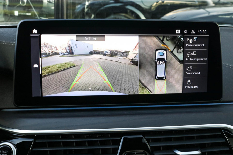 BMW 5 Serie Touring 530e xDrive M-Sport | Trekhaak | Pano | Soft close | Laser | Massage | Ambient Air | Head Up | Achterassturing
