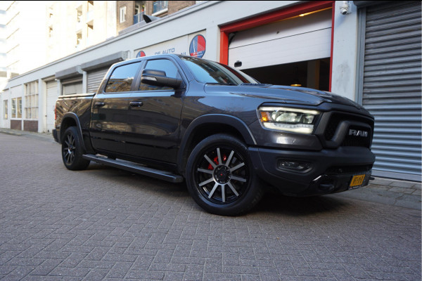 Dodge Ram 1500 5.7 V8 4x4 Crew Cab Rebel Sport | Luchtvering PANO -dak | Black Line | Off Road | Groot Navi | Apple CarPlay | Keyless | 20inch | Harman Kardon | Full LED | LPG onderbouw | excl BTW