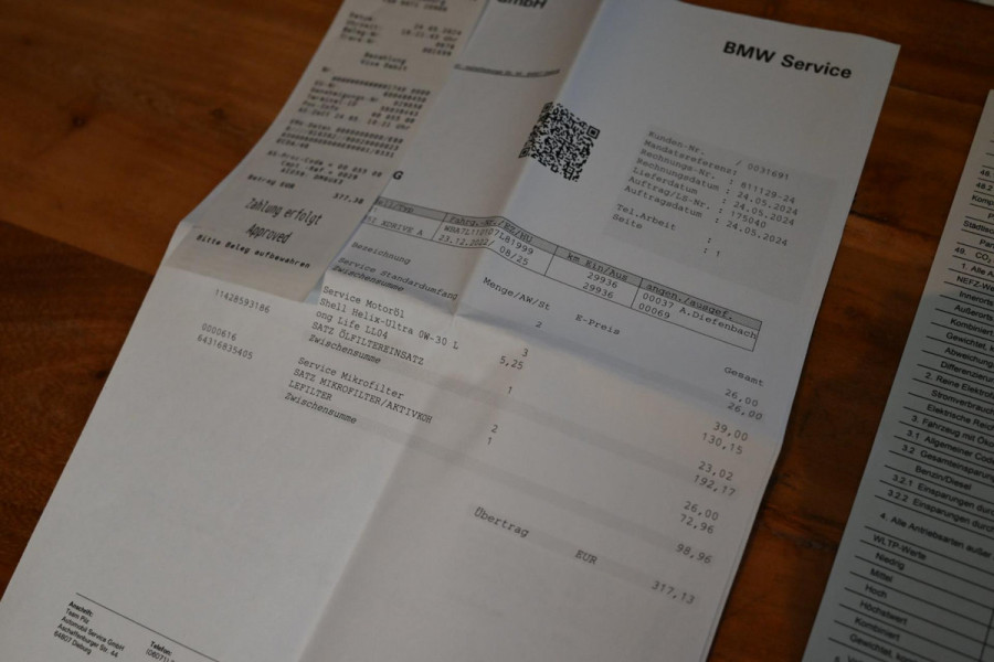 BMW 1-serie M135i xDrive High Executive 306 PK Dealer o.h. Adaptive Head Up H&K Camera Keyless 18''