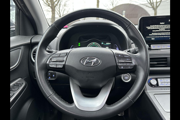 Hyundai Kona EV Fashion 64 kWh 100% SOH| DEALER ONDERHOUDEN | ZEER NETTE AUTO. | DODE HOEK| KRELL PREMIUM AUDIO| HEAD-UP | CAMERA|