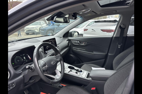 Hyundai Kona EV Fashion 64 kWh 100% SOH| DEALER ONDERHOUDEN | ZEER NETTE AUTO. | DODE HOEK| KRELL PREMIUM AUDIO| HEAD-UP | CAMERA|