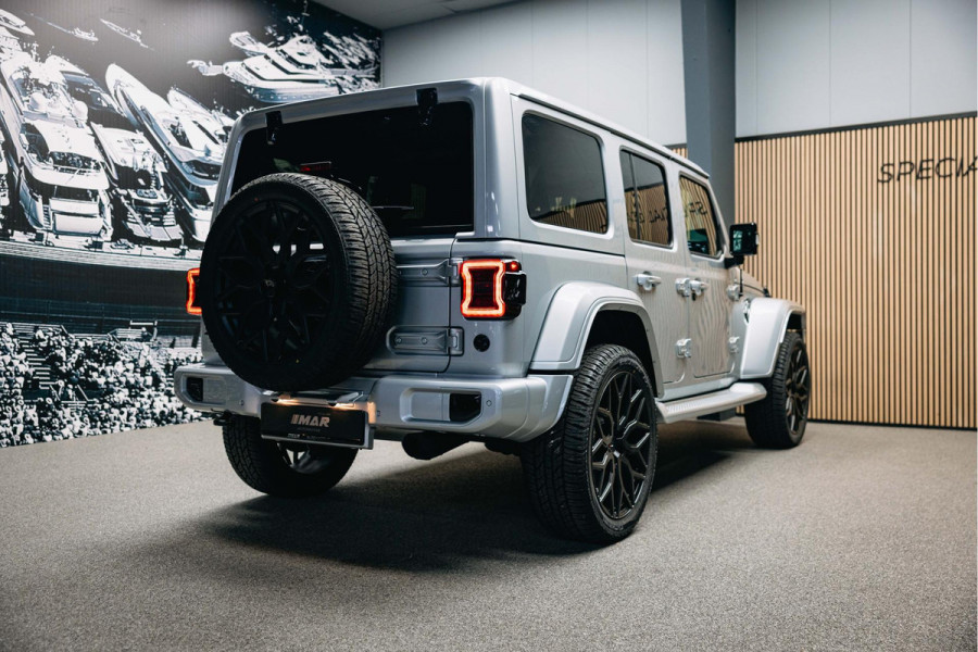 Jeep Wrangler Unlimited 4xe 380 Sahara | Corse Edition Custom Made | Hybride | Stuur- en Stoelverwarming | Achteruitrijcamera |