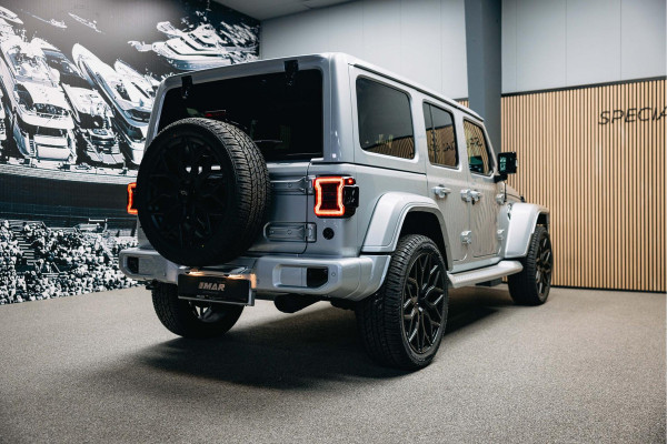 Jeep Wrangler Unlimited 4xe 380 Sahara | Corse Edition Custom Made | Hybride | Stuur- en Stoelverwarming | Achteruitrijcamera |