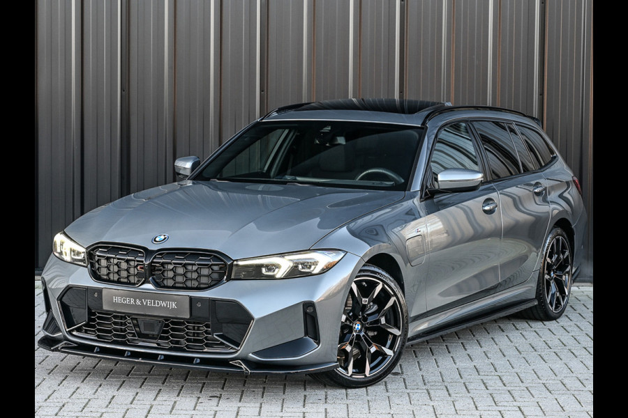 BMW 3 Serie Touring 330e xDrive · M sport · Accu 19,5kWh · Trekhaak · Panoramadak · Active Cruise · Panoramadak · Camera · Ambiance interieu