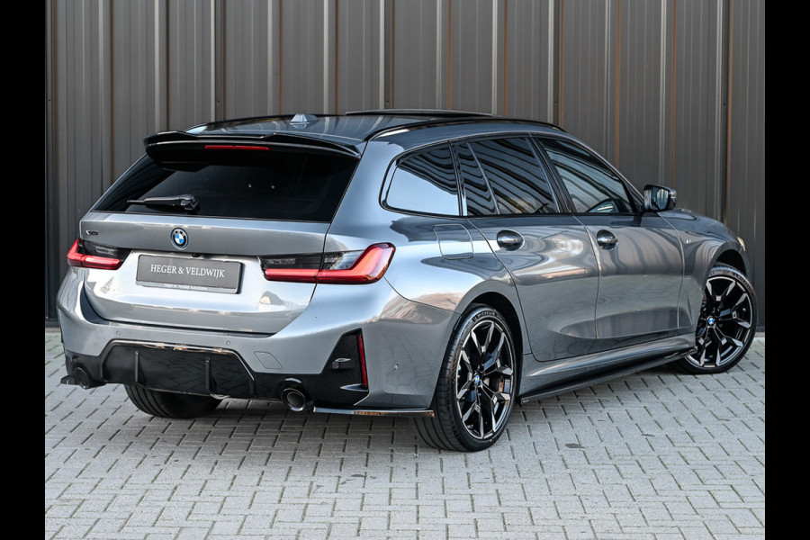 BMW 3 Serie Touring 330e xDrive · M sport · Accu 19,5kWh · Trekhaak · Panoramadak · Active Cruise · Panoramadak · Camera · Ambiance interieu
