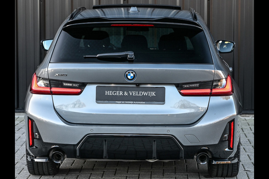 BMW 3 Serie Touring 330e xDrive · M sport · Accu 19,5kWh · Trekhaak · Panoramadak · Active Cruise · Panoramadak · Camera · Ambiance interieu
