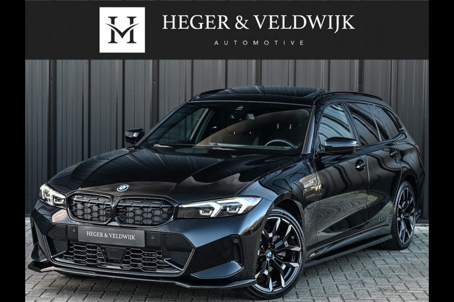 BMW 3 Serie Touring 330e xDrive · M sport · Accu 19,5kWh · Trekhaak · Panoramadak · Active Cruise · Camera · Ambiance interieur ·