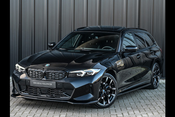 BMW 3 Serie Touring 330e xDrive · M sport · Accu 19,5kWh · Trekhaak · Panoramadak · Active Cruise · Camera · Ambiance interieur ·