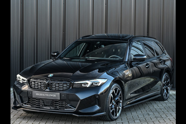 BMW 3 Serie Touring 330e xDrive · M sport · Accu 19,5kWh · Trekhaak · Panoramadak · Active Cruise · Camera · Ambiance interieur ·