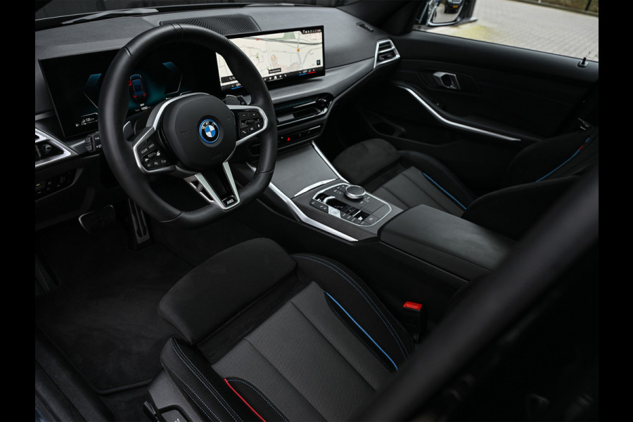 BMW 3 Serie Touring 330e xDrive · M sport · Accu 19,5kWh · Trekhaak · Panoramadak · Active Cruise · Camera · Ambiance interieur ·