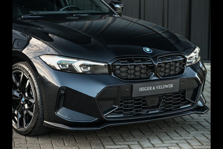 BMW 3 Serie Touring 330e xDrive · M sport · Accu 19,5kWh · Trekhaak · Panoramadak · Active Cruise · Camera · Ambiance interieur ·