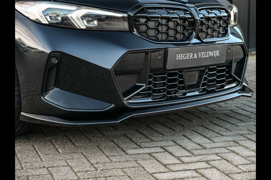 BMW 3 Serie Touring 330e xDrive · M sport · Accu 19,5kWh · Trekhaak · Panoramadak · Active Cruise · Camera · Ambiance interieur ·