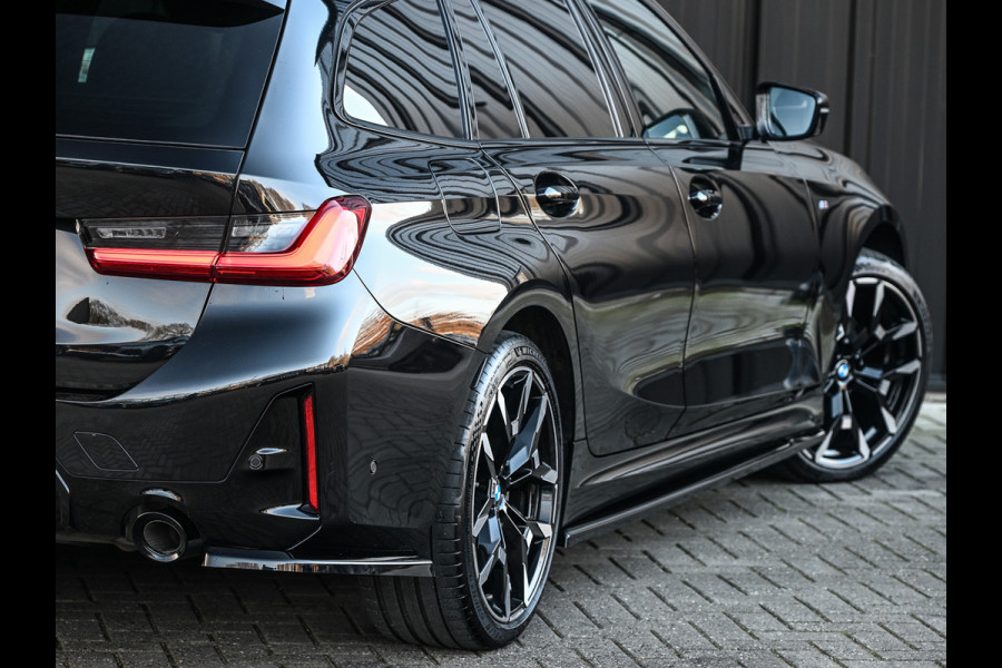 BMW 3 Serie Touring 330e xDrive · M sport · Accu 19,5kWh · Trekhaak · Panoramadak · Active Cruise · Camera · Ambiance interieur ·