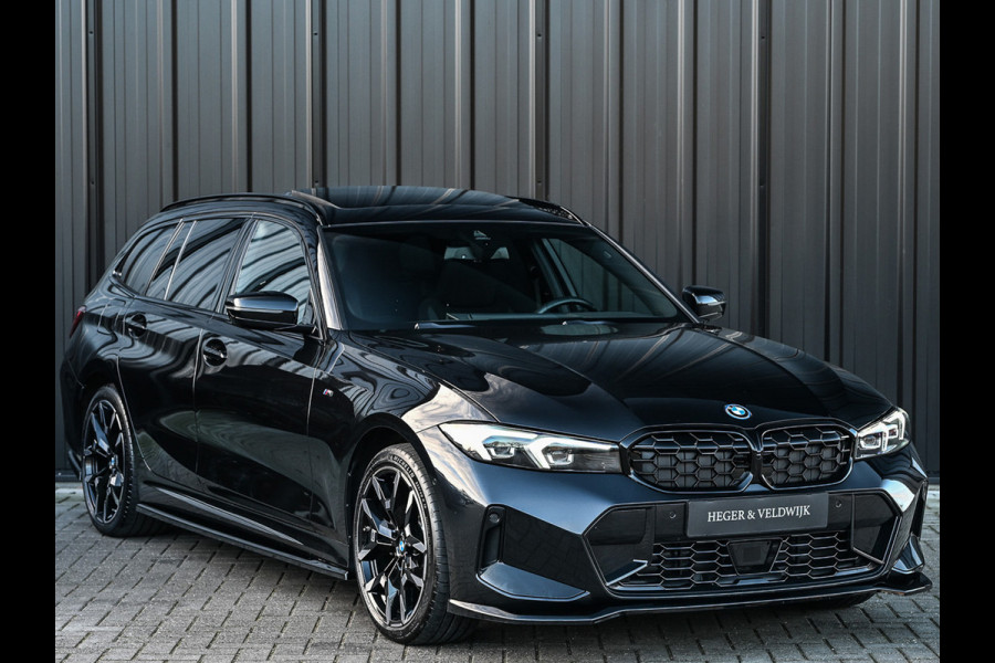BMW 3 Serie Touring 330e xDrive · M sport · Accu 19,5kWh · Trekhaak · Panoramadak · Active Cruise · Camera · Ambiance interieur ·
