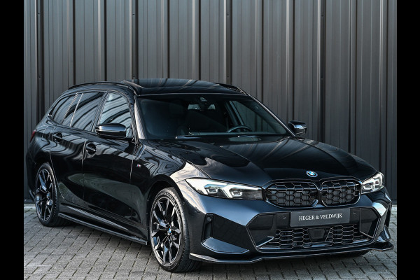 BMW 3 Serie Touring 330e xDrive · M sport · Accu 19,5kWh · Trekhaak · Panoramadak · Active Cruise · Camera · Ambiance interieur ·