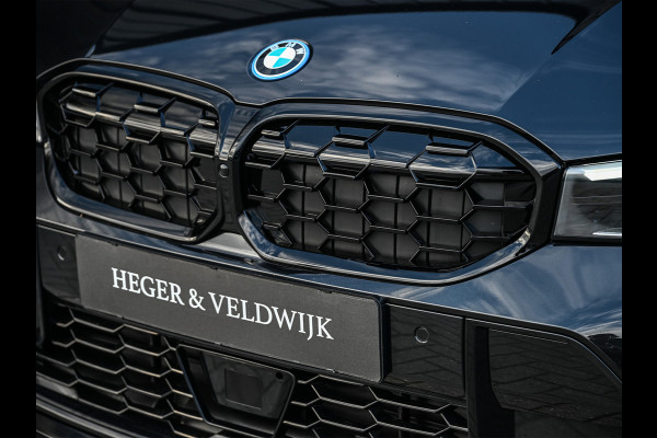 BMW 3 Serie Touring 330e xDrive · M sport · Accu 19,5kWh · Trekhaak · Active Cruise · Hifi audio · Camera · Ambiance interieur · Full Stylin