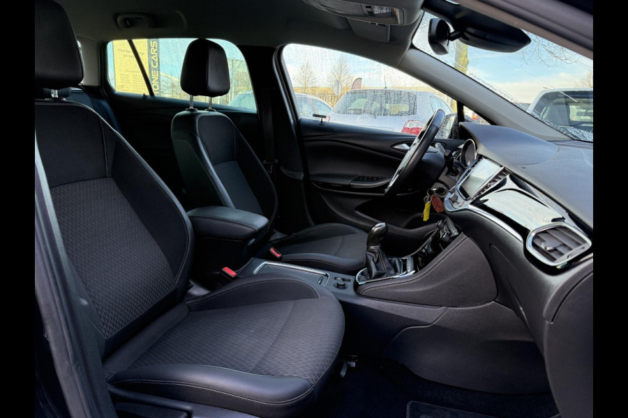 Opel Astra Sports Tourer 1.4 Innovation Navi,Camera,150pk,Rijstrooksensor,Stoelverw.Stuurverw.Clima,Cruise,Halfleder,Lm velgen,Pdc,V+A,Lm velgen,6 Bak,Apk tot 10-2026