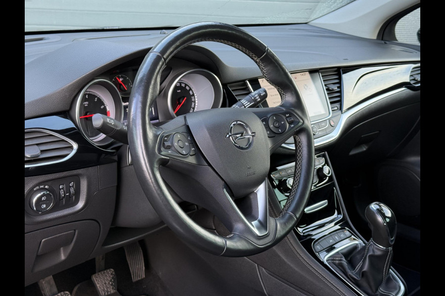 Opel Astra Sports Tourer 1.4 Innovation Navi,Camera,150pk,Rijstrooksensor,Stoelverw.Stuurverw.Clima,Cruise,Halfleder,Lm velgen,Pdc,V+A,Lm velgen,6 Bak,Apk tot 10-2026
