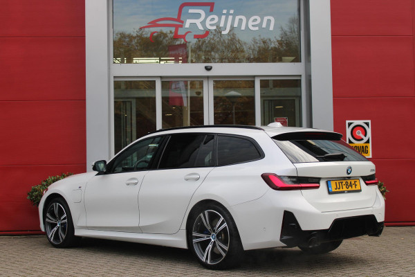 BMW 3 Serie Touring 330e 292PK M-SPORT | PANORAMISCH SCHUIF/KANTEL DAK | M-SPORT PRO-PAKKET | M-SPORT REMMEN UITGEVOERD IN DONKERBLAUW MET M LOGO | BMW LIVE COCKPIT PROFESSIONAL | CURVED DISPLAY |DRIVING ASSISTANT INCL. HEAD-UP DISPLAY | PARKING ASSIST INCL. ACHTERUITRIJCAMERA | ADAPTIEVE LED KOPLAMPEN |SHADOW LINE | M-SPORTSTOELEN VOOR | LEDER VERNASCA MET CONTRAST STIKSELS M-SPORT | STOEL VERWARMING | DRAADLOZE APPLE CARPLAY | ELEKTRISCH VERSTELBARE STOELEN MET GEHEUGEN FUNCTIE | HEAD UP DISPLAY | DRAADLOZE TELEFOONLADER | DODEHOEK BEWAKING | COMFORT PACK INCL. ELEKTRISCHE ACHTE