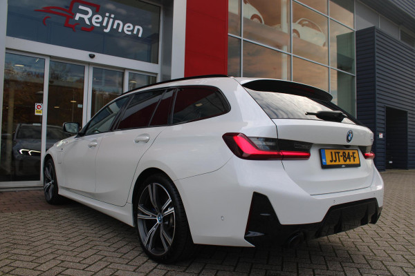 BMW 3 Serie Touring 330e 292PK M-SPORT | PANORAMISCH SCHUIF/KANTEL DAK | M-SPORT PRO-PAKKET | M-SPORT REMMEN UITGEVOERD IN DONKERBLAUW MET M LOGO | BMW LIVE COCKPIT PROFESSIONAL | CURVED DISPLAY |DRIVING ASSISTANT INCL. HEAD-UP DISPLAY | PARKING ASSIST INCL. ACHTERUITRIJCAMERA | ADAPTIEVE LED KOPLAMPEN |SHADOW LINE | M-SPORTSTOELEN VOOR | LEDER VERNASCA MET CONTRAST STIKSELS M-SPORT | STOEL VERWARMING | DRAADLOZE APPLE CARPLAY | ELEKTRISCH VERSTELBARE STOELEN MET GEHEUGEN FUNCTIE | HEAD UP DISPLAY | DRAADLOZE TELEFOONLADER | DODEHOEK BEWAKING | COMFORT PACK INCL. ELEKTRISCHE ACHTE