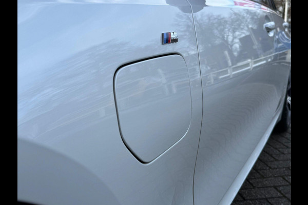 BMW 3 Serie Touring 330e 292PK M-SPORT | PANORAMISCH SCHUIF/KANTEL DAK | M-SPORT PRO-PAKKET | M-SPORT REMMEN UITGEVOERD IN DONKERBLAUW MET M LOGO | BMW LIVE COCKPIT PROFESSIONAL | CURVED DISPLAY |DRIVING ASSISTANT INCL. HEAD-UP DISPLAY | PARKING ASSIST INCL. ACHTERUITRIJCAMERA | ADAPTIEVE LED KOPLAMPEN |SHADOW LINE | M-SPORTSTOELEN VOOR | LEDER VERNASCA MET CONTRAST STIKSELS M-SPORT | STOEL VERWARMING | DRAADLOZE APPLE CARPLAY | ELEKTRISCH VERSTELBARE STOELEN MET GEHEUGEN FUNCTIE | HEAD UP DISPLAY | DRAADLOZE TELEFOONLADER | DODEHOEK BEWAKING | COMFORT PACK INCL. ELEKTRISCHE ACHTE