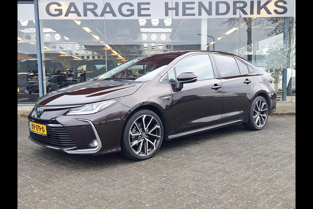 Toyota Corolla 1.8 Hybrid Executive Sedan | Trekhaak | Blindspot | Adaptive CC | Leder-Stof | Occasion