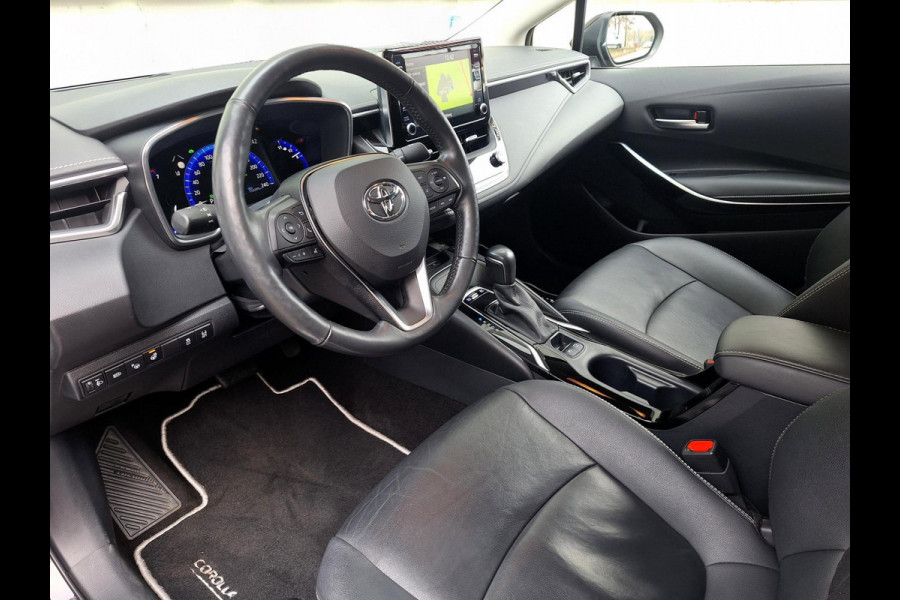Toyota Corolla 1.8 Hybrid Executive Sedan | Trekhaak | Blindspot | Adaptive CC | Leder-Stof | Occasion