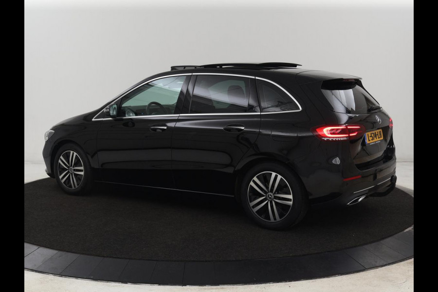 Mercedes-Benz B-Klasse 180 Business Solution Luxury | Panoramadak | Leder | Stoelverwarming | Trekhaak | Memory | Keyless | Sfeerverlichting | Matrix LED | Navigatie | Widescreen